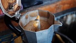 moka pot use coffee maker with hot coffee Stock Footage