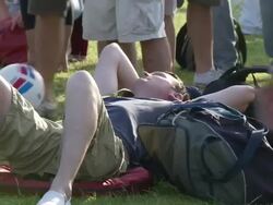 People Queue in Sunny Weather at Wimbledon News Clip