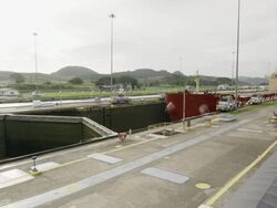 Panama canal locks opening ship crossing Stock Footage