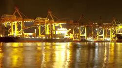 Bangkok Shipyard Port Terminal Working at Night Time Lapse Panning Stock Footage