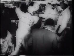 B/W 1961 flight crew helping Alan Shepard into space capsule / Mercury 3 - first American in space Stock Footage