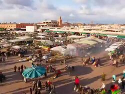 WS T/L View of Djemaa el Fna square at dusk with moving people / Marrakech, Morocco Stock Footage