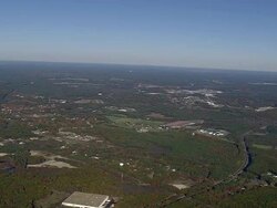WS AERIAL View of New hampshire surrounded by fall in tree / Massachusetts, United States Stock Footage