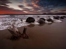SLOW MOTION: Moeraki Boulders at Sunrise Stock Footage