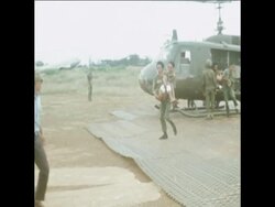 SYND19/11/71 WOUNDED DROPPED BY HELICOPTER TO AMBULANCES, TROOPS IN FIELD OPERATION News Clip