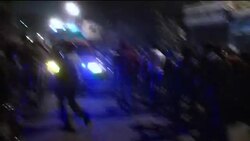 Protesters clash with police near interior ministry News Clip