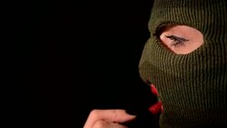 Dangerous and beautiful criminal girl Stock Footage