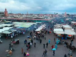 WS View of Djemaa el Fna square at dusk with people moving / Marrakech, Morocco Stock Footage
