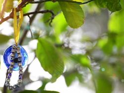 NazarlÄ±k (Evil Eye Bead) on the tree Stock Footage