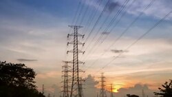 high voltage post.High-voltage tower sky background Stock Footage