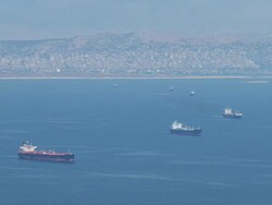 WS AERIAL Shot of flight across piraeus with many freighters and sailboats / Piraeus, Peloponnese, Greece Stock Footage