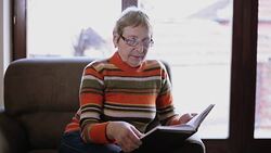 Senior woman reading a book Stock Footage