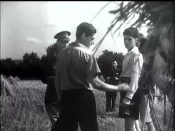 HARVESTING SCHOOLBOYS VISITED BY HIS MAJESTY - News Clip