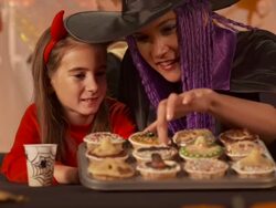 HD: Mother And Daughter Looking Decoration On Pastries Stock Footage