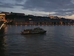 Slow pan up the River Danube at sunset Stock Footage