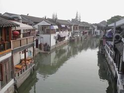 WS HA View of grand canal between traditional houses in Zhujiajiao / Shanghai,  China Stock Footage