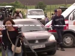 OSCE Arrive At MH17 Plane Crash Site News Clip