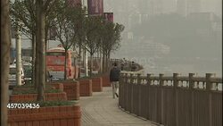 People walking along river in Chongqing News Clip