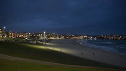 Bondi Beach at nightfall, Sydney Australia Stock Footage
