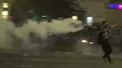 Police use tear gas to disperse demonstrators from central Cairo, enforcing new protest law News Clip