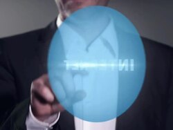 Businessman pressing virtual "internet" button Stock Footage