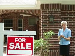 Real estate agent using smart phone. Home, sign. Stock Footage