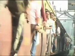 Crowded train in Mumbai Stock Footage