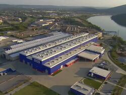 WS AERIAL View of Lookout Mountain and Tennessee River and Alstom Turbine factory / Chattanooga, Tennessee, United States  Stock Footage