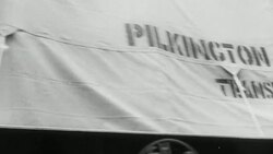 1951 MONTAGE Workers transporting and installing a piece of plate glass 8 feet by 50 feet / St. Helens, Lancashire, England Stock Footage