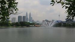 City of Kuala Lumpur from Lake Titiwangsa, Malaysia Stock Footage