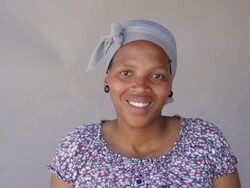 African woman laughing while looking at the camera Stock Footage