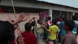 Groups of workers clash in dispute over closure of garment factories News Clip