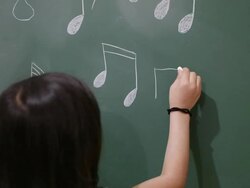 write notes on blackboard Stock Footage