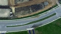 Aerial Straight Down View Neighborhood Housing Community to construction yard Destruction Round Rock near Austin , Texas Suburbia Streets houses roads yards Stock Footage