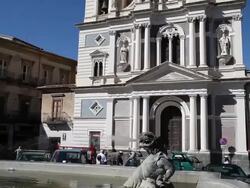 Caltanissetta, the faÃƒÂ§ade of San Sebastiano church, Piazza Garibaldi, piazza Garibaldi with the Triton fountain in the foreground Stock Footage