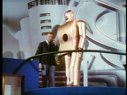 1940 man talking to robot + turning it / New York World's Fair / industrial Stock Footage