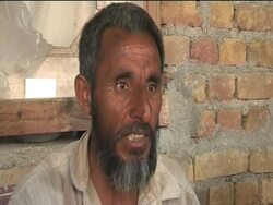 WRAP Bin Laden's compound, families of men who worked in compound, protest News Clip