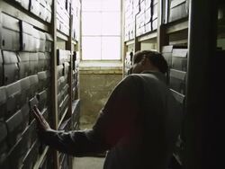 MS DS Young male fashion designer taking box from shelf / Salt Lake City,Utah,USA Stock Footage