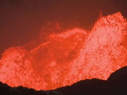Large wave of lava explodes from lava lake onto crater wall, Marum Volcano, Ambrym Island, Vanuatu Stock Footage