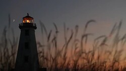 Silhouette of Lighthouse At Dusk Stock Footage
