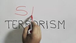 Hand writing a 'stop terrorism' message on a white board using a black marker Stock Footage