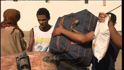 Evacuees prepare to depart Tripoli port by ship News Clip