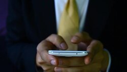 Businessman hand using mobile phone , business strategy concept Stock Footage