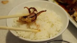 Eating squid japanese food Stock Footage