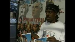 Pavement seller selling 9/11 posters News Clip