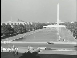 1948: WASHINGTON, D.C.: SCENICS: TU WS Washington Monument obelisk bracketed by tree branches (flowering possibly cherry), HA WS (POV Lincoln Memorial) Reflecting Pool w/ temporary elevated footbridges. VS Lincoln Memorial, building, statue. Instructional Video