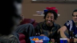 Group of young adult males celebrate watching sports on TV medium shot Stock Footage