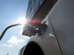 HD: Charging An Electric Vehicle In The City Stock Footage