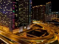 T/L WA ZO Traffic in downtown Hong Kong at night Stock Footage