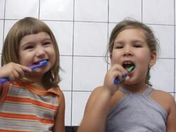 Girls brushing teeth (HD) Stock Footage